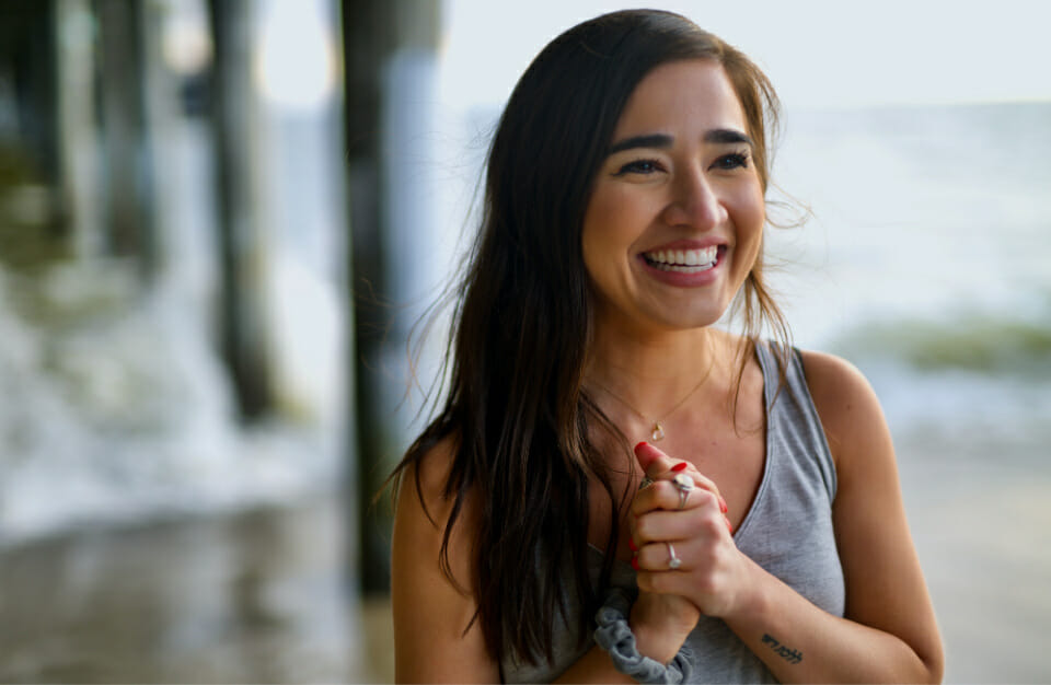 Taking in the good and practising gratitude - image of a woman smiling