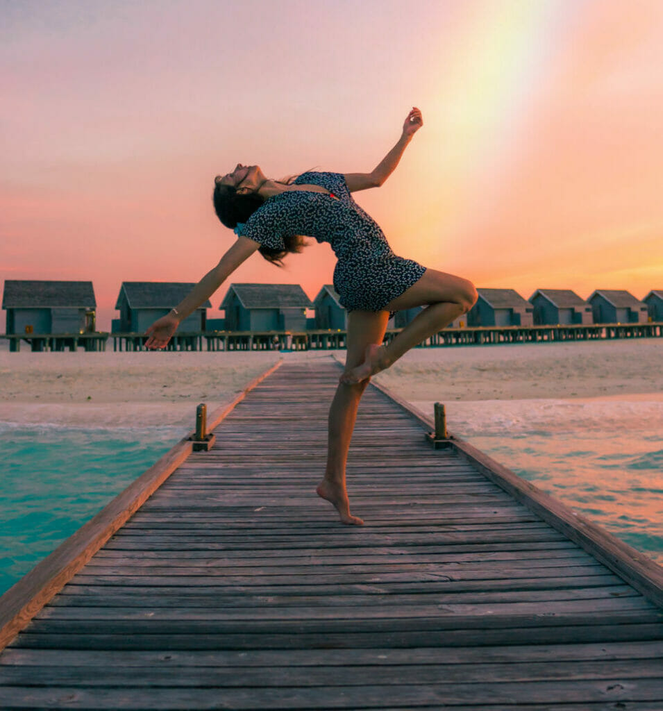 happy woman with rainbow