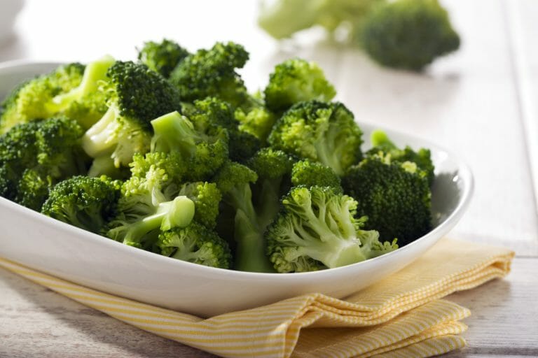 Image of broccoli in a bowl which is great for menstrual cramps