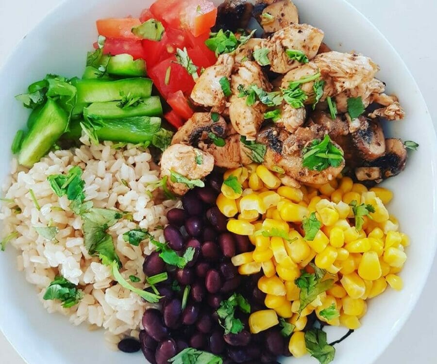 Image of a chicken burrito bowl full of foods to include in your diet for menopause