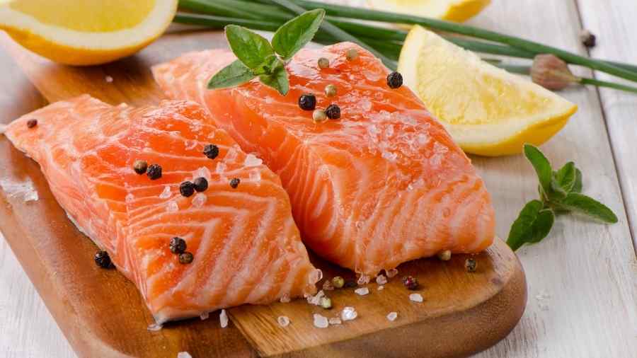 Image of two slices of salmon which makes a great food for period pain