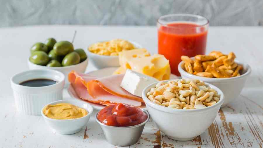 Image of a range of high salt containing foods that should be avoided in your diet for menopause